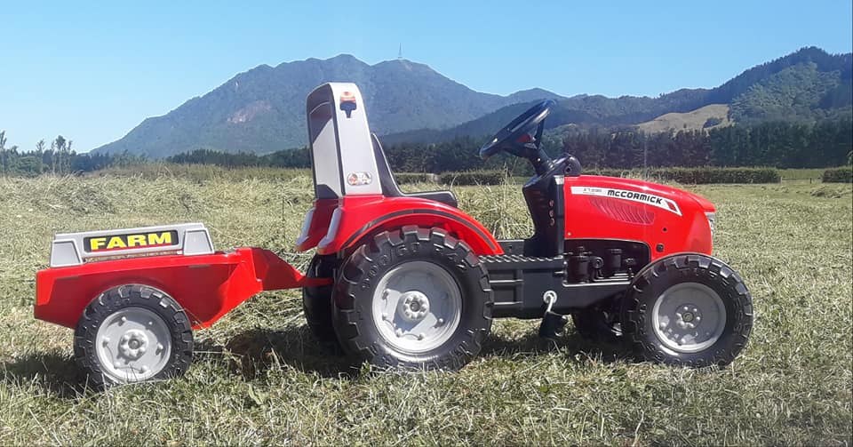 McCORMICK PEDAL TRACTOR WITH TRAILER